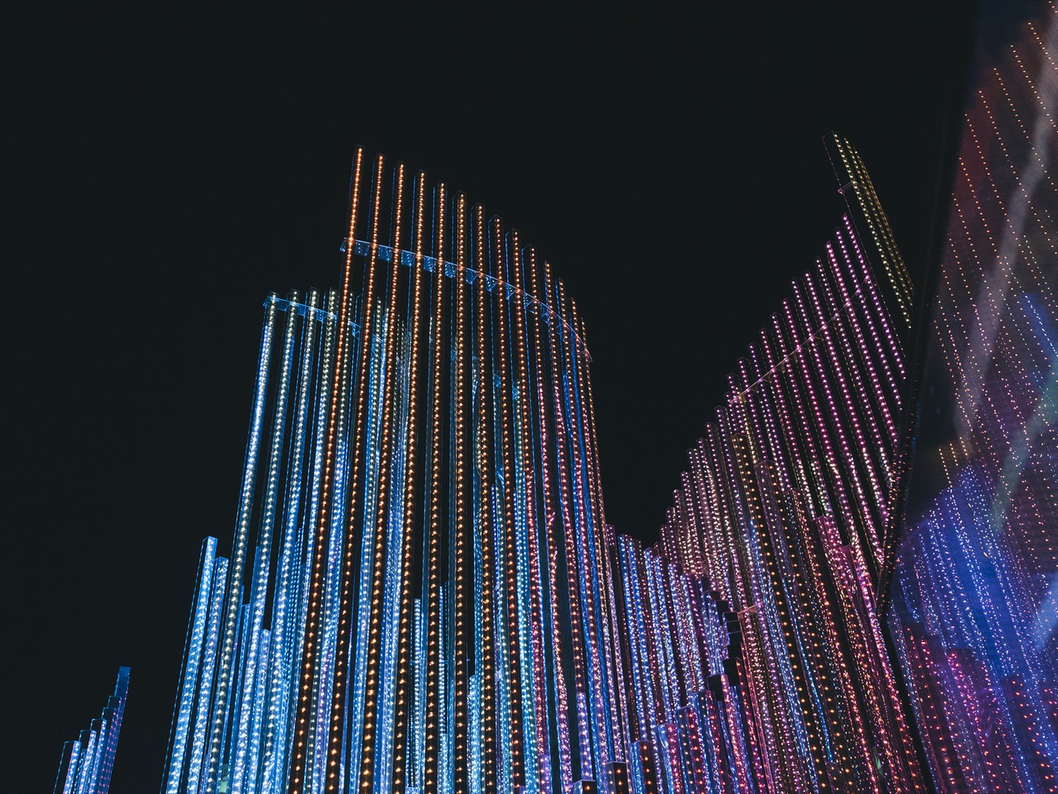 The sculpture washed in colour, driven by the crowd's data